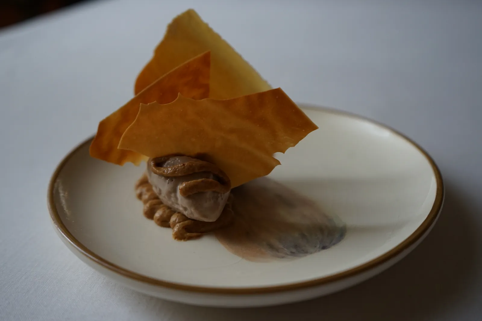 Mushroom and banana dessert with a crisp tuile, private chef tasting menu